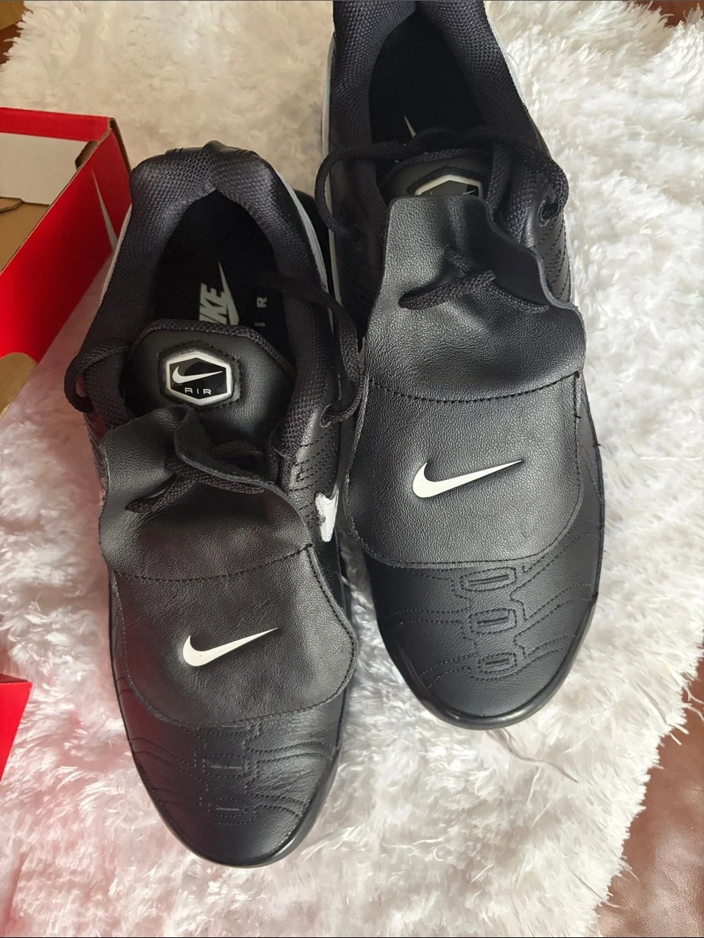 Nike women’s Black Athletic Slip-On Sneakers with White Swoosh